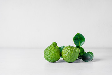 Bergamot fruit on white wooden  background .