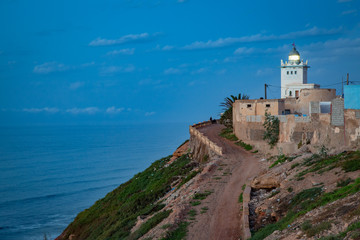 Fototapeta na wymiar Lighthouse on the coast of Sidi Ifni