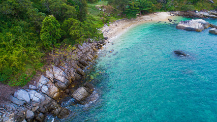 Aerial view over palm trees, rocks and sea in Phuket, Thailand
