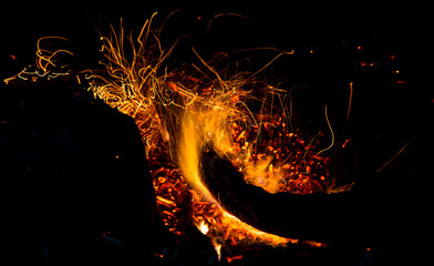 fire with sparks on a black background