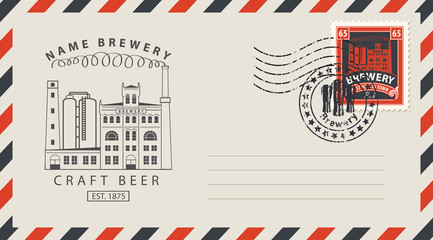 an envelope with a postage stamp for a pub with a vintage building brewery