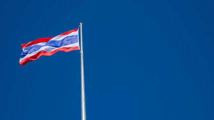 thai flag with blue sky background