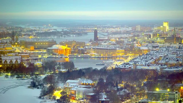 A wintry Stockholm at dusk seen from from tower Kaknastornet. Yellowish tint.