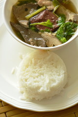 boiled pork blood and entrails soup eat couple with rice on plate