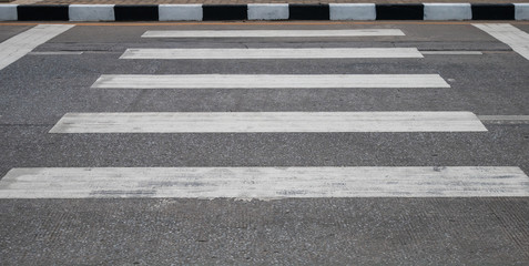 Crosswalk on the raod in the city.