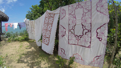 tradition in Madagascar - table cloths hung  for sale