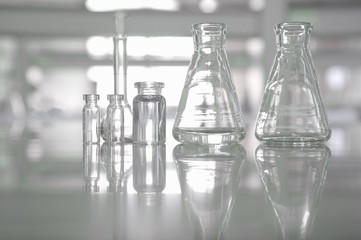 clear glassware flask vial in science laboratory background