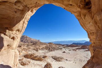 Timna park - The big arch with Desert landscape view