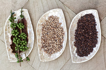 Row of Roasted Coffee Beans in Different Levels. All on Rustic S