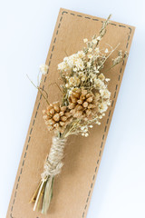 A bouquet of dried flowers on white background