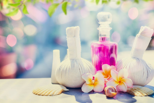 Spa and massage setting with  frangipany flowers for Healthy  treatments at spring or summer nature background