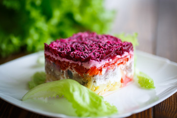 salad with herring and boiled vegetables