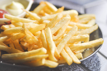  French fries with ketchup and mayonnaise