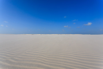 Fototapeta na wymiar White sand dunes panorama from Lencois Maranhenses National Park