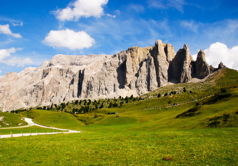 Fototapeta na wymiar view of dolomites mountains in italy on a blue sky background