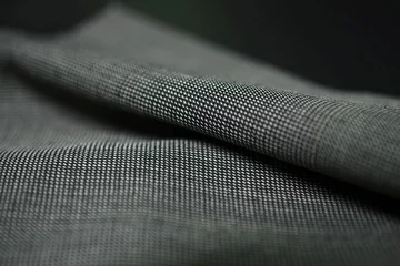 Papier Peint photo autocollant Poussière close up roll pattern gray fabric of suit