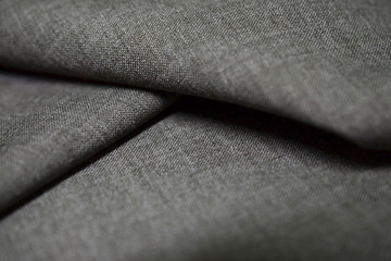 close up texture dark gray fabric of suit