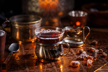 Hot tea with candle