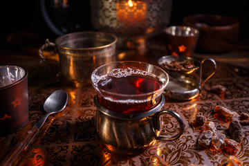 Hot black tea with candle