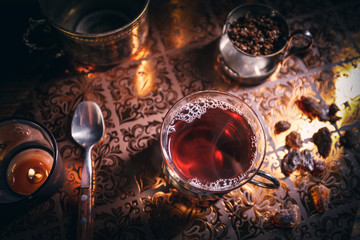 Obraz na płótnie Canvas Black tea in a glass cup