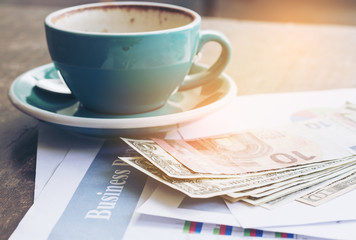 cup of coffee and money