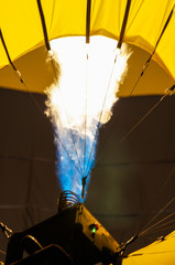 Flames of a yellow hot air balloon