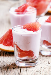 Cottage cheese mousse with cream and grapefruit, vintage wooden