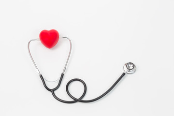 Healthy concept;Red heart and a stethoscope on white background