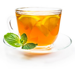 Isolated transparent cup of tea with lemon slice