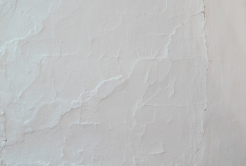 Old white scratched plastering wall surface