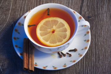 cup of tea with lemon and cloves