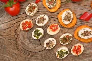 appetizers cheese and bruschetta with herbs, tomato and chilli peppers,Vegetarian starter appetizer