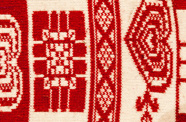 Traditional ethnic red and white carpet knitted