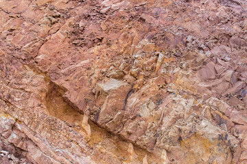 Irregular pattern orange stone wall