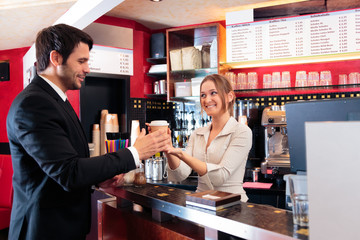 Friendly Bartender At A Cafe