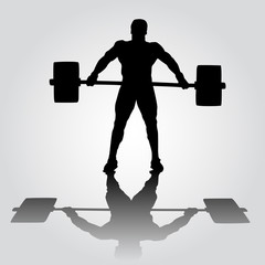 silhouette of athlete is doing snatch exercise. weightlifting