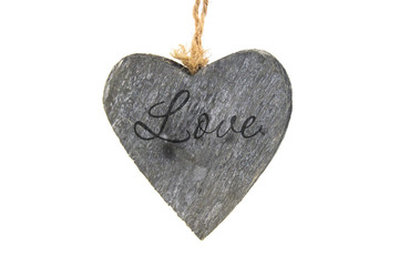 Isolated wooden heart with the word Love