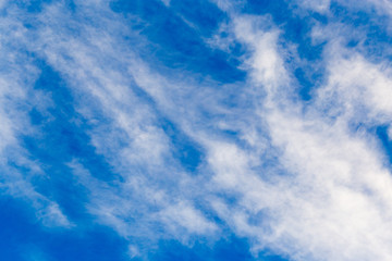 clouds in the blue sky as background
