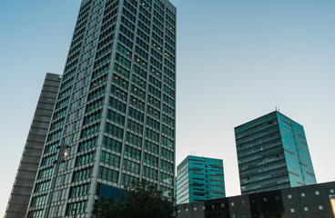 Obraz na płótnie Canvas Twilight scene of tall buildings in city