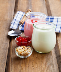 natural yoghurt on a wooden background