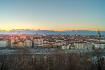 Obraz premium panorama of the city of turin from above at sunset with mole Antonelliana