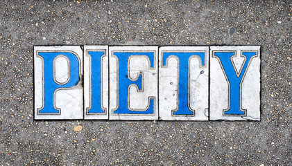 New Orleans vintage blue tile name marker for Piety Street - 132540520