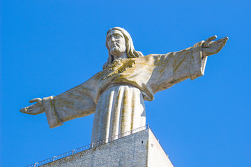 Lisbon, Portugal - June 20, 2016 statue of Christ (Cristo-Rei) or christ the king in lisbon portugal in blue sky background /  monument of Jesus  (Almada)