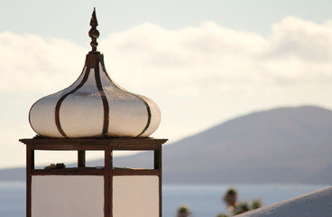 Lanzarote spire on top of building with Tenerife in the background