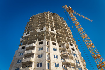 Fototapeta premium Two tower cranes building