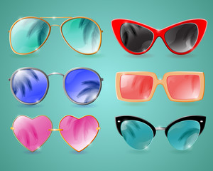 Set of colorful realistic sunglasses with palm reflection