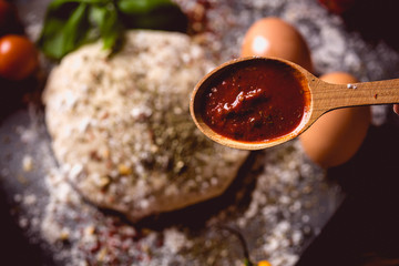 Dough with spices is being prepared to bake