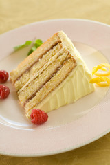 slice of layer cake with berries