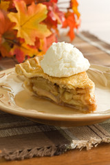 slice of apple pie with ice cream
