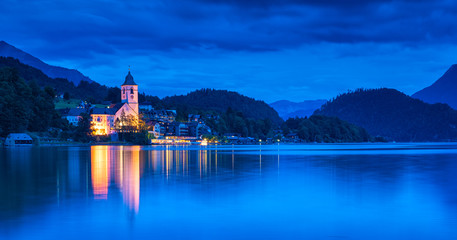 View on the lakefront of the city of St. Wolfgang, Austria in blue hour